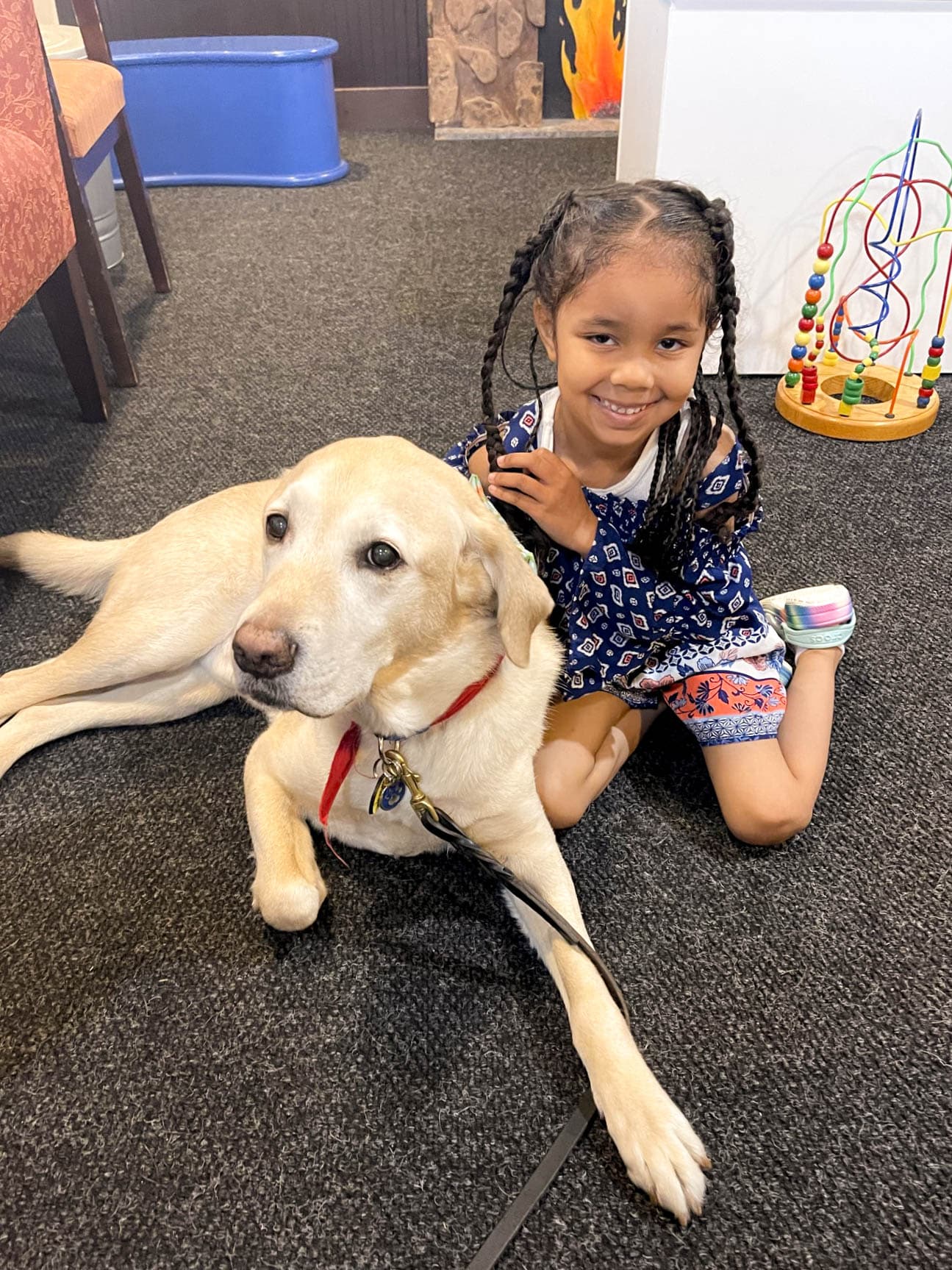 Patient smiling with dog