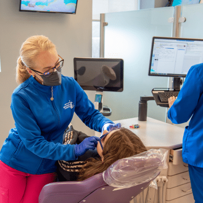 Child receiving orthodontic treatment by dr. Ritter, representing best age for first orthodontic check-up